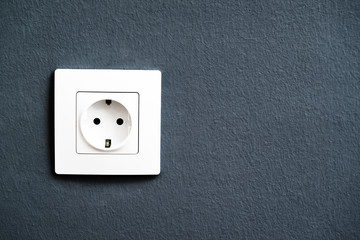 Electrical outlet socket on wall