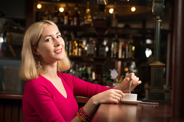 woman with a cup of coffee