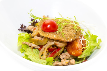 Warm salad of beef and vegetables in a restaurant
