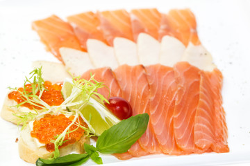 cutting of the fish on the table in a restaurant