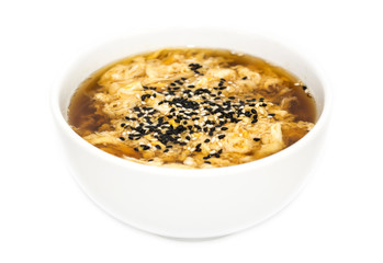Japanese soup with cheese and fish on white background