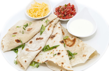 Mexican food dishes at the restaurant on a white background