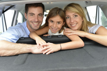 Cheerful family of three ready for vacation