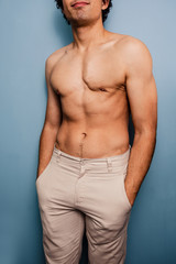 Obraz premium Sexy young man with hands in pocket