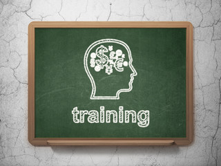 Education concept: Head With Finance Symbol and Training on