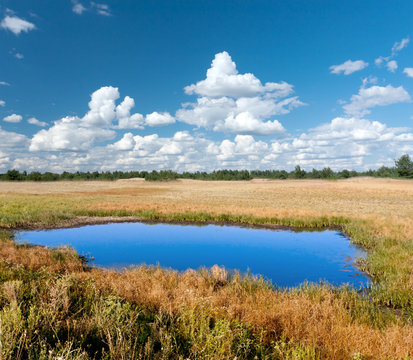 blue lake in steppe