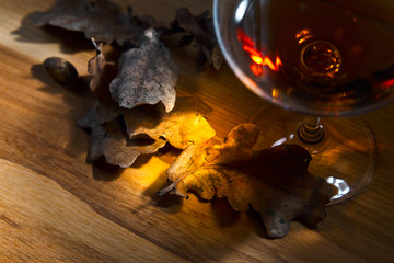 brandy and dried oak leaves