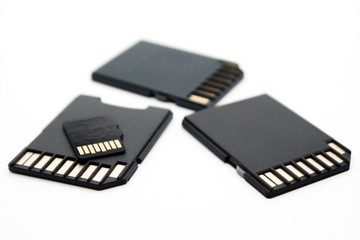 Diiferent size memory cards on white background