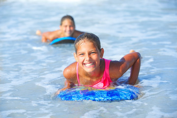 Summer vacation - surfer girls.