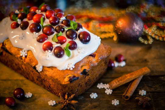 Cranberry cake on wooden table-traditional christmas bakery