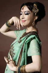 Poster Asian beautiful woman wearing luxurious wedding dress © gracelin