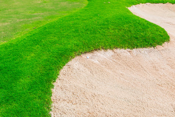 Grass and sand at golf course