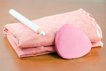 Tailor's chalk and pencil for drawing on fabric.