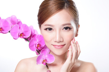 Fototapeta na wymiar beautiful face with pink orchids