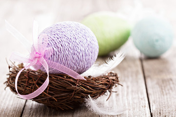 Decorative Easter egg in a nest