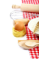 Supplies and ingredients for baking or making pasta.