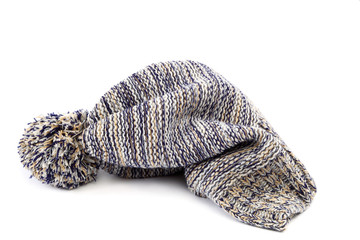 Cold winter clothing - checkered hat or cap on white background.