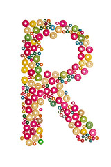 Letter R made of wooden beads
