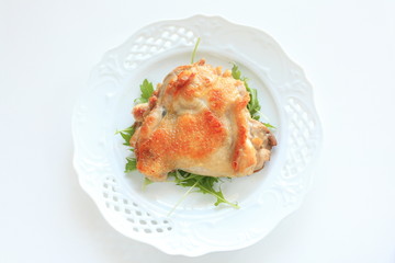 grilled chicken on baby leaf salad