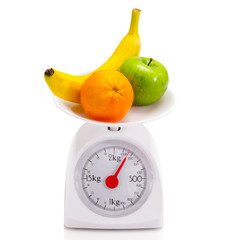 Healthy food on balance scale