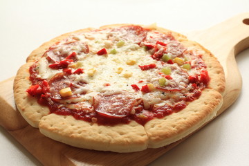 Salami and corn pizza