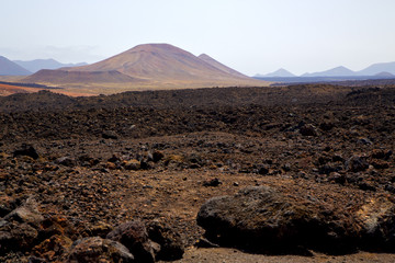 volcanic  lanzarote  spain  timanfaya  rock  sky  hill and summe