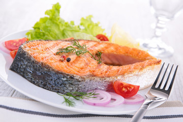 grilled salmon steak and vegetables