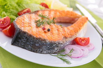 grilled salmon steak and vegetables