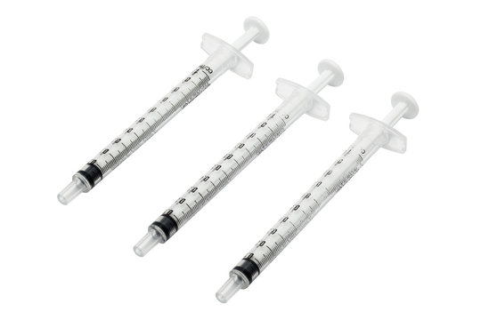 Used syringes isolated on white