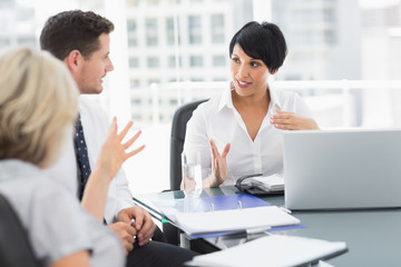 Business people in discussion at office