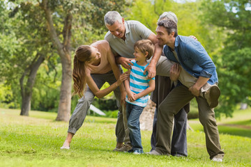 Fototapeta premium Family playing in park