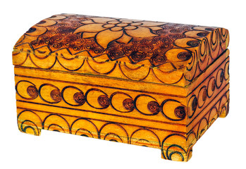 a colorful casket engraved and painted with the lid open on a white background isolated