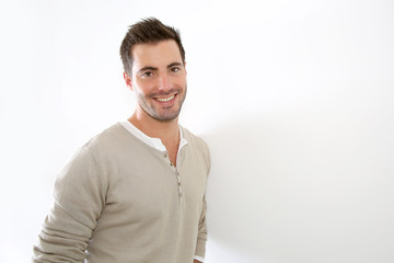 Handsome guy standing on white background