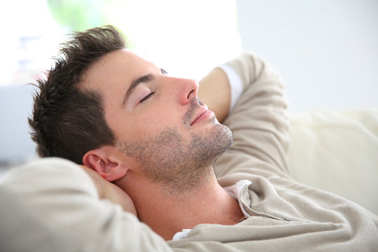 Man taking a nap in sofa