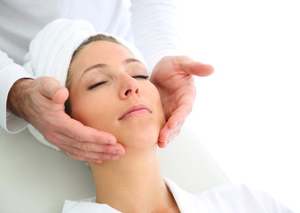 Fototapeta na wymiar Closeup of woman haveing a face massage