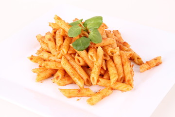Pasta with pesto rosso decorated with cress
