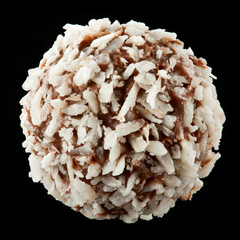 Chocolate praline macro on black background