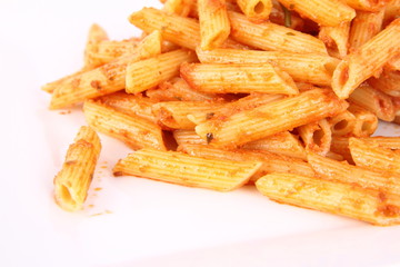 Pasta with pesto rosso decorated with cress