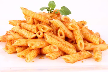 Pasta with pesto rosso decorated with cress