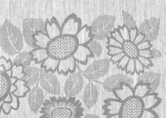 Fond fleuri broché gris.