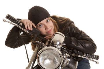 Obraz na płótnie Canvas woman black leather motorcycle lay look