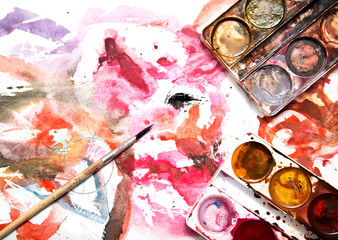 painting watercolor paint on white paper