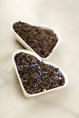 Earl Grey and Lady Grey black loose tea leaves in heart shape,on