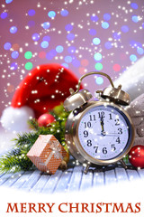 Wine glasses and Christmas decoration on bright background