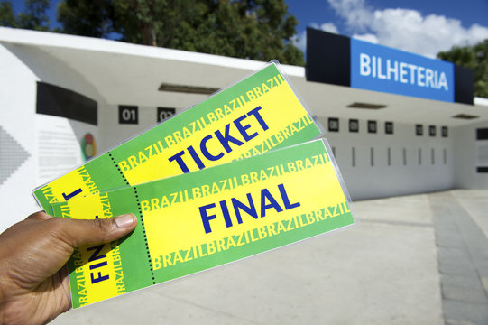 Soccer Fan Holds Two Brazil Tickets at the Stadium