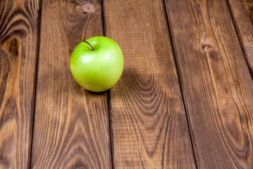 Apple on a wooden background