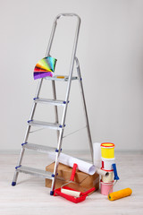 Metal ladder and paint in room