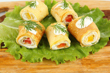Egg rolls with cheese cream and paprika,