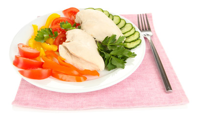 Boiled chicken breast on plate with vegetables isolated on