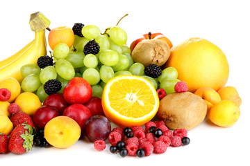 Fresh fruits and berries isolated on white